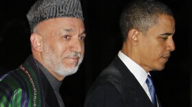 President Obama walks with Afghan President Hamid Karzai at the presidential palace in Kabul on March 28. In recent comments, Karzai has blamed the West for many of his troubles, causing concern in Washington.