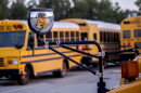 An electric-powered school bus rumbles to life at Chula Vista Elementary School District on Oct. 12, 2021.