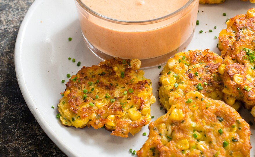 Corn fritters. In Season 18 of AMERICA'S TEST KITCHEN, hosts Bridget Lancaster and Julia Collin Davison head into the test kitchen to bring viewers equipment reviews, taste tests, and recipes for the home cook.