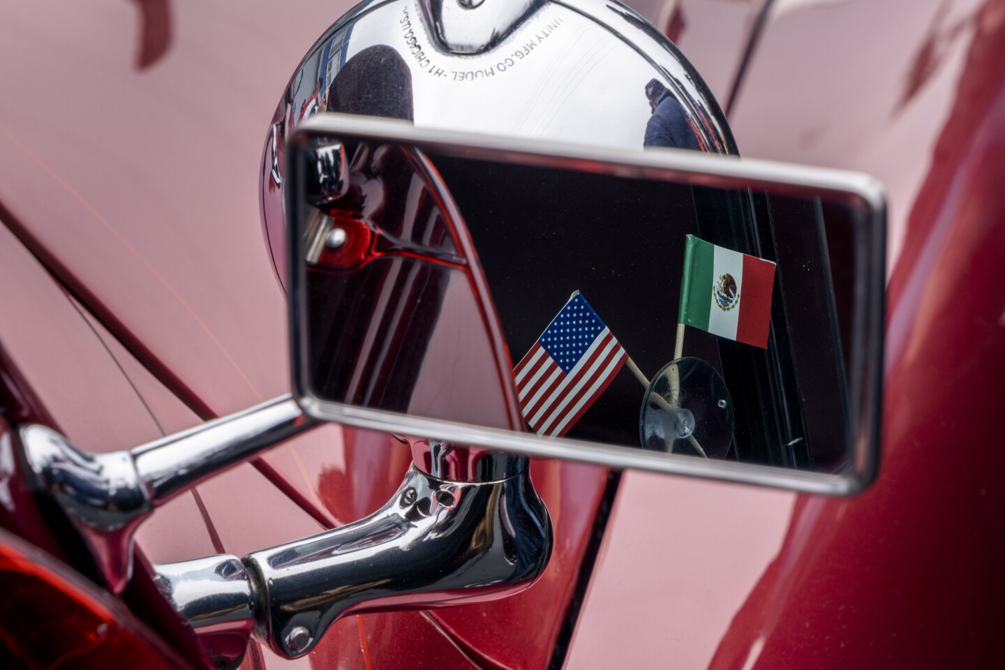 Many of the lowriders that came out to celebrate the removal of National City’s last “Cruising Prohibited” sign flew American and Mexican flags to honor the Mexican-American routs of lowrider culture, National City, May 19, 2023.