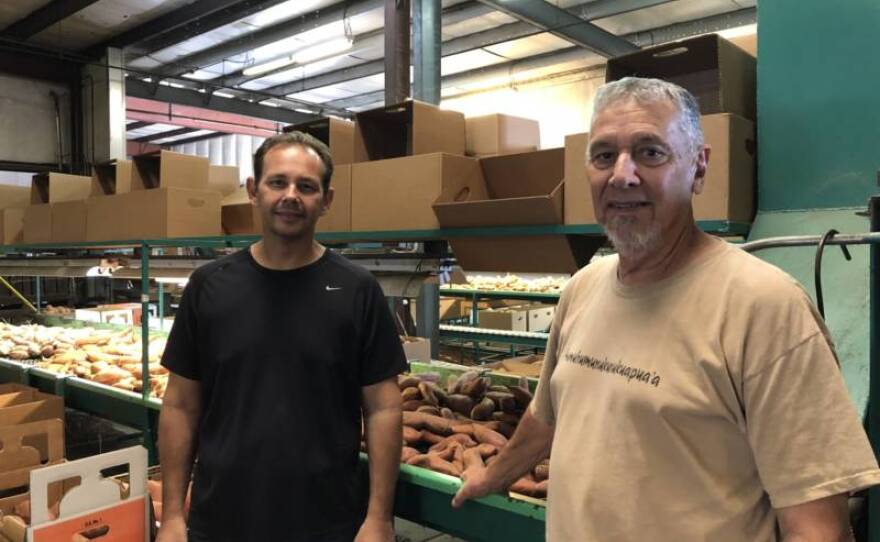 Aaron and Stan Silva at the packing plant for their family farm, Doreva Produce, in this undated photo.