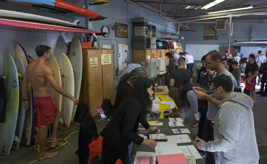 People vote at the Los Angeles lifeguard station at Venice Beach on Tuesday.