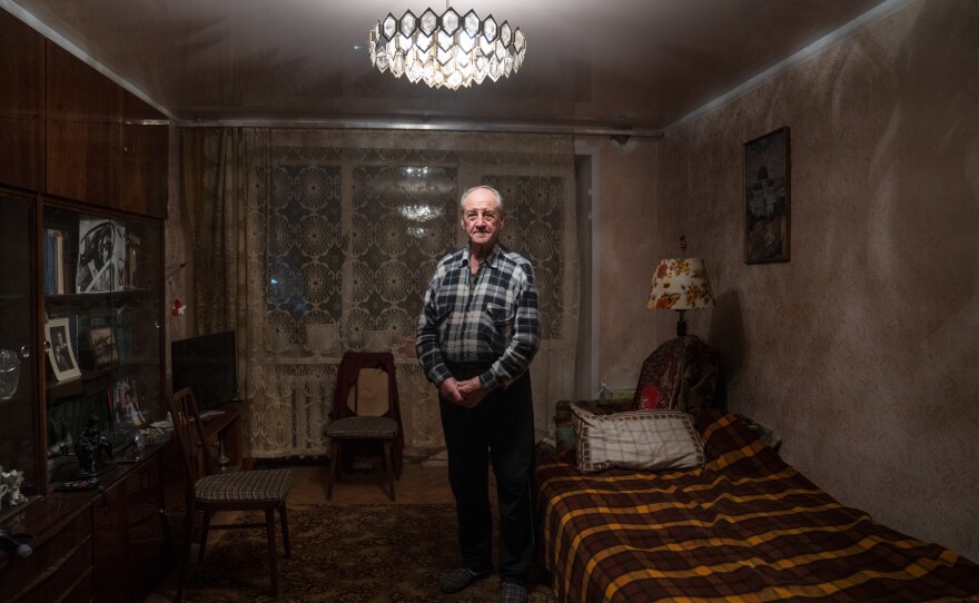 Pavlo Komodovskyi in his apartment in Kyiv, where he's stayed despite the war.