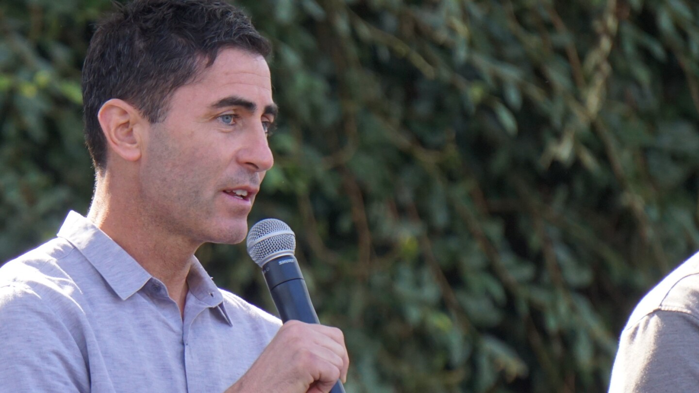 San Diego Padres president of baseball operations and general manager A.J. Preller speaks during a fan event at Petco Park.