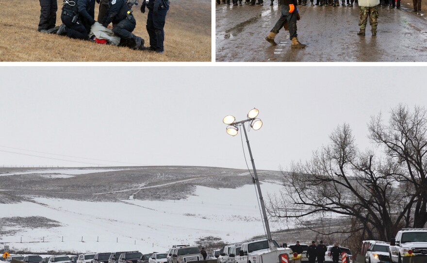 Police make arrests (top, left) as they move south on highway 1806 (top, right), just outside the entrance to the Oceti Sakowin camp on Wednesday. (Bottom) Police vehicles line up at a roadblock ahead of Wednesday's evacuation deadline.