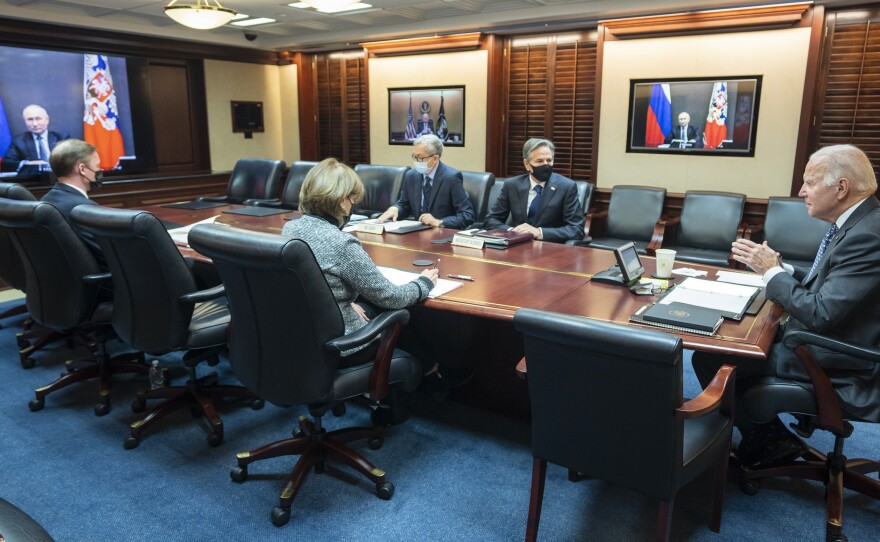 President Joe Biden speaks as he meets virtually via a secure video conference with Putin from the Situation Room at the White House on Dec. 7. Putin urged the West to make a legal pledge not to deploy forces and weapons to Ukraine.