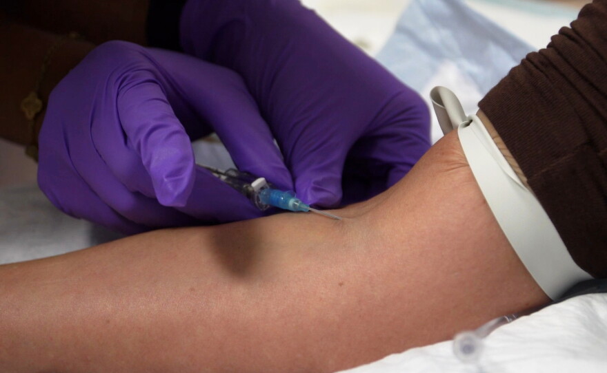 In this image taken from video, an IV infusion is administered at Pure Alchemy Wellness in Chula Vista, Calif., in November 2025.