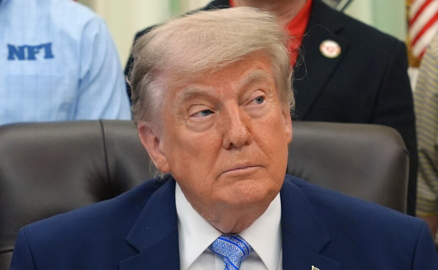 President Donald Trump attends an event about loosening a federal refrigerant rule, in the Oval Office at the White House, Thursday, May 21, 2026, in Washington.