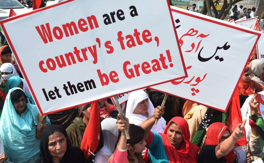 Supporters of the Pakistan Peoples Party chant slogans as they march in Lahore to mark International Women's Day.