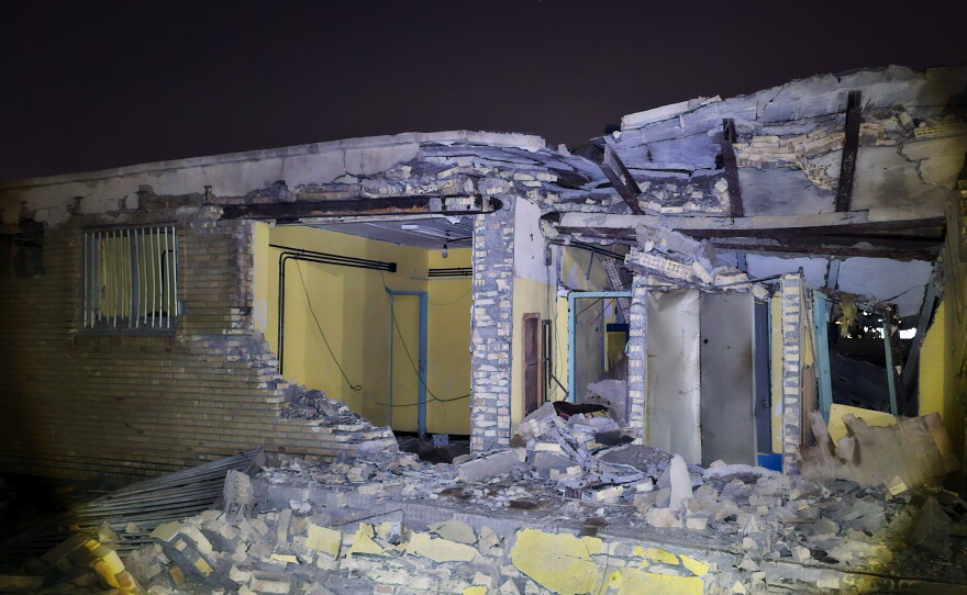 Damage is seen at a building that Iranian media said was hit in a U.S. strike in Kuhestak, southern Iran, early Wednesday.