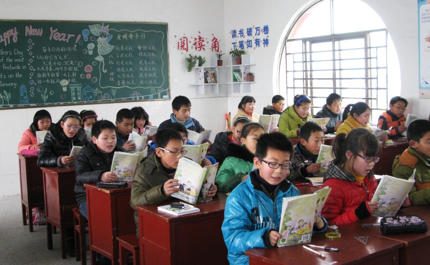 A number of the students at the Yangkou Township Elementary School face difficulties at home, where many of them are being raised by grandparents after their parents have gone to the cities seeking work.