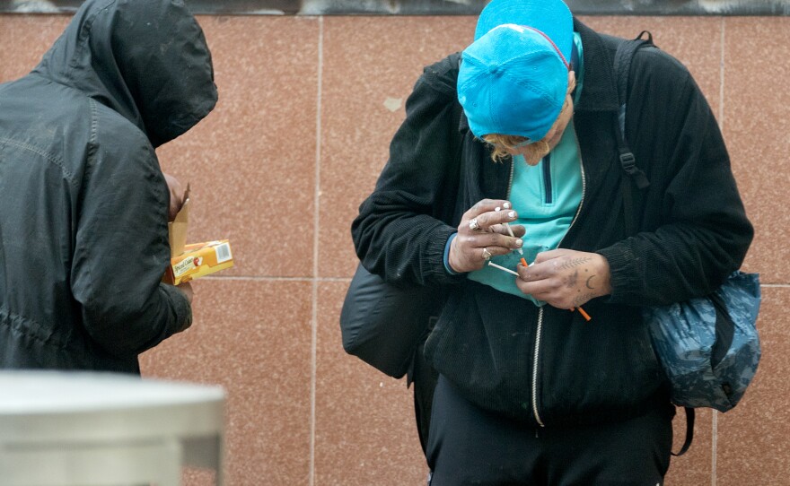 Unidentified people with drug paraphernalia in downtown Portland, Ore.