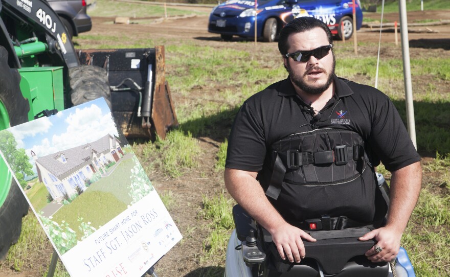 Marine Staff Sgt. Jason Ross at the groundbreaking of his smart home, Jan. 27, 2015.