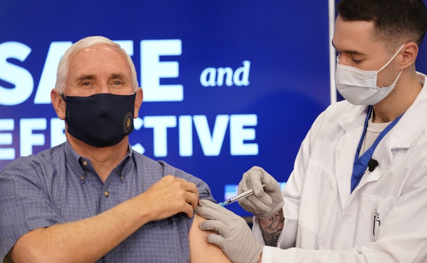 Vice President Pence receives the COVID-19 vaccine at the White House complex on Friday.