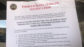 A notice of closure on the door of a Poway restaurant on Dec. 2, 2019, because of the water contamination.
