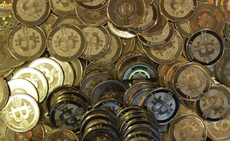 A photo of tokens representing bitcoins.