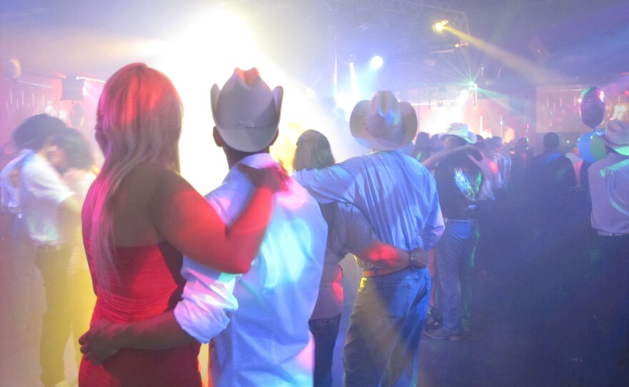 "Narco corrido" fans take in a show at Bandolero's in El Paso, Texas in May.