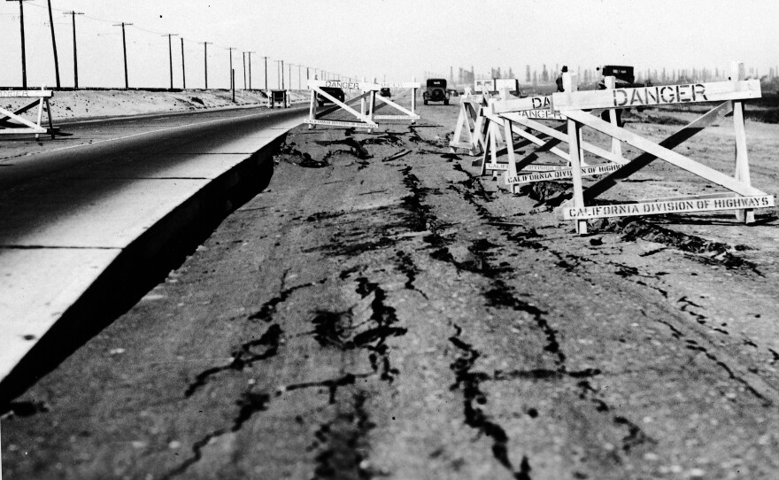 This photo made available by the U.S. Geological Survey shows cracks in a roadway, described as ground failures, in Long Beach, Calif., after a massive earthquake struck, March 10, 1933.