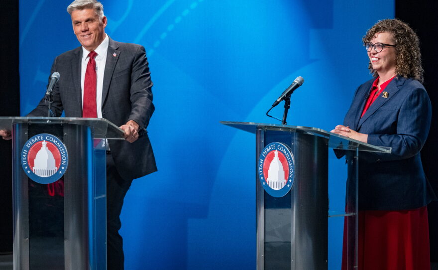 Candidates Phil Lyman and Rep. Celeste Maloy smile at the end of the 3rd Congressional District GOP primary debate in Salt Lake City, Utah, on June 1.