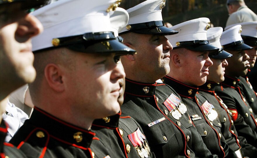 U.S. Marines wait for the beginning of the dedication ceremony of the National Museum of the Marine Corps in November 2006 in Quantico, Va. For more than 200 years, the Marine Corps has been hitting the beaches. But over the past decade, the Marines have operated like a smaller Army in Iraq and Afghanistan, far from the water's edge.