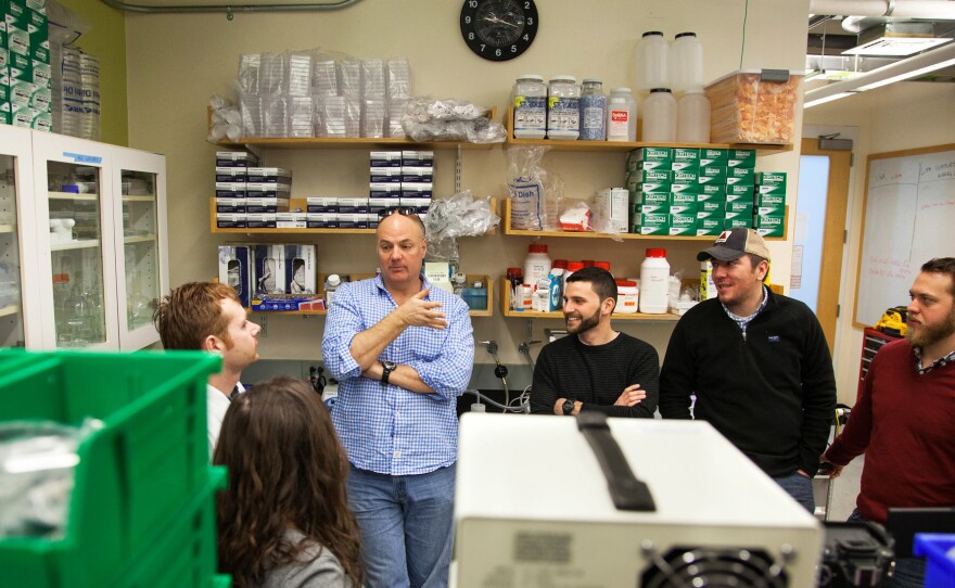 The Disease Biophysics Group talks over progress in their research. John Doyle (from left), Stacey Fitzgibbons, Kit Parker, Ian Perkins, Jonathan Wood and John Ferrier are all veterans of the U.S. military.