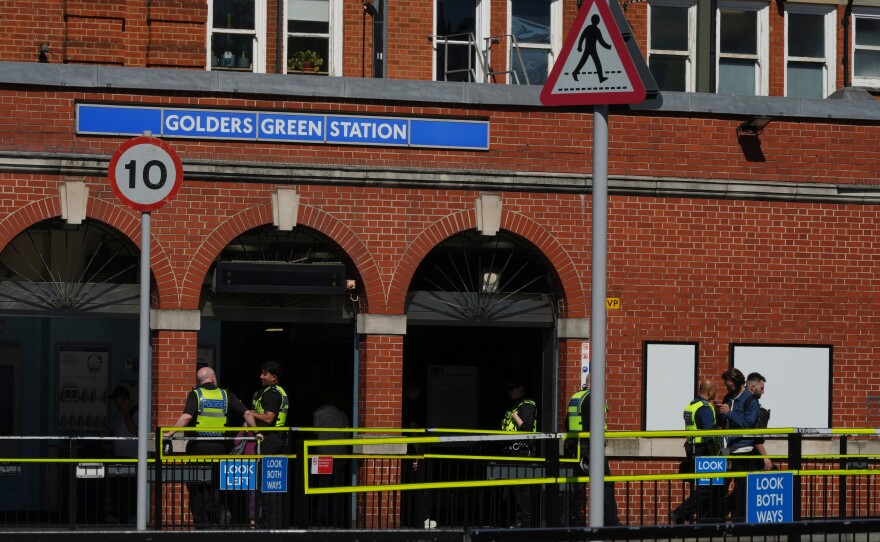 Police on duty outside Golders Green tube station in London, Thursday, April 30, 2026, near the scene where two people were recently stabbed in the Golders Green neighbourhood, that has a large Jewish community.