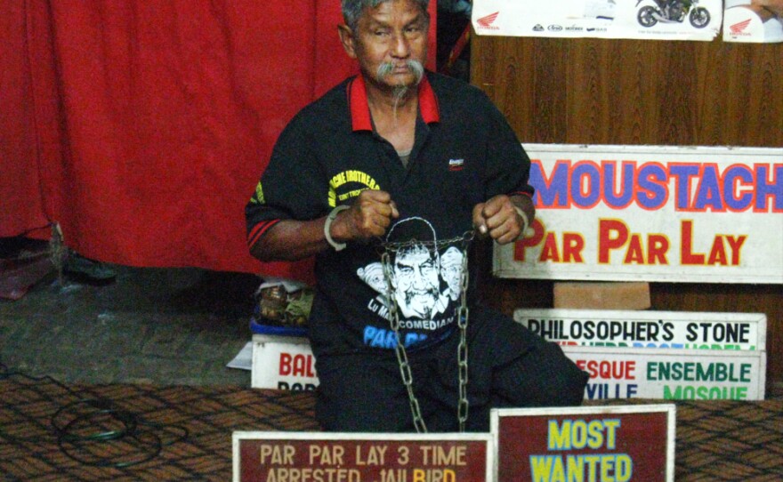Par Par Lay, a member of the Moustache Brothers vaudeville troupe whose show includes biting political satire, performs recently in Mandalay, in northern Myanmar. Par Par Lay, who had been imprisoned, says he is not yet convinced the reforms are real.