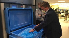 Tim Jennings (foreground) and Jon Horton, officials at Sentara Norfolk General Hospital in Norfolk, Va., have been lining up supplies, including dry ice, in preparation for the coronavirus vaccine.
