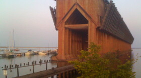 A decommissioned ore dock sits in Marquette Harbor, a reminder of the area's mining history.