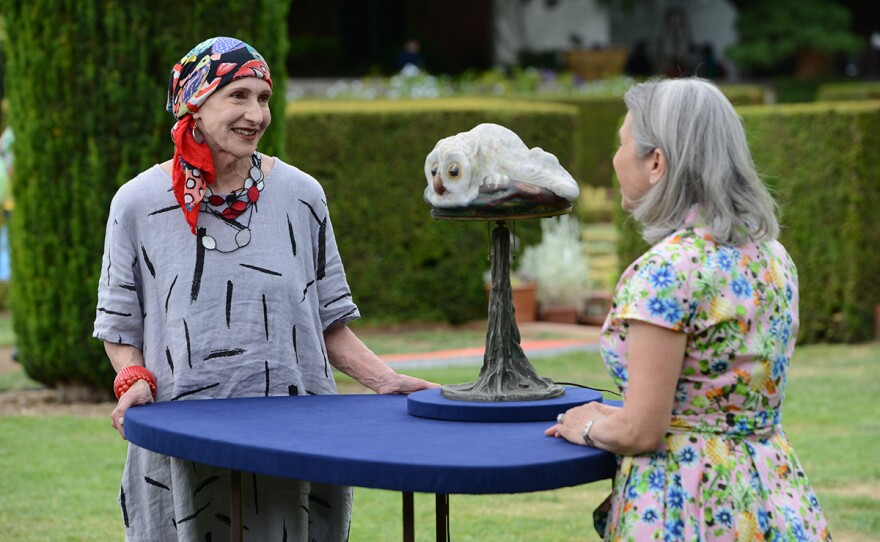 Arlie Sulka (right) appraises a Pairpoint puffy owl lamp, ca. 1907, in Woodside, Calif. ANTIQUES ROADSHOW “Filoli, Hour 1” premieres Monday, January 2 at 8/7C PM on PBS.