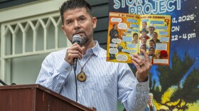 Ethan Banegas reads from the comic book at an event on June 13, 2025 to celebrate the opening of the exhibit at La Jolla Historical Society.