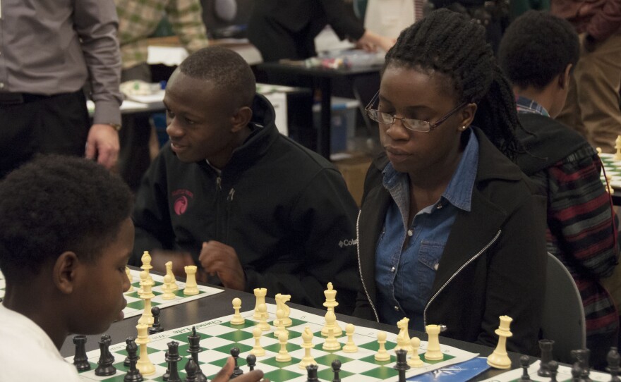 Phiona Mutesi is pictured playing chess at Rainer-Vista Boys & Girls Club in this undated photo.