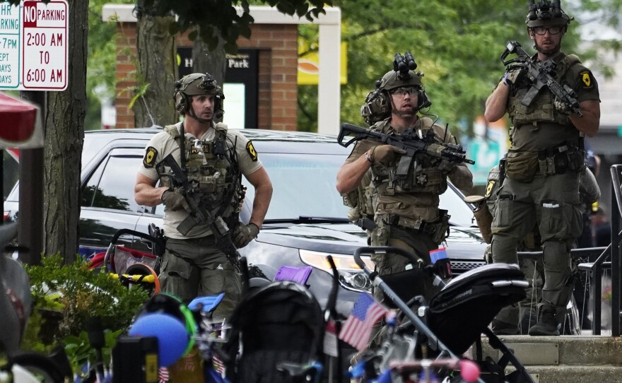 Downtown Highland Park, Ill., remained roped off Tuesday afternoon after the deadly shooting at a July 4 parade.