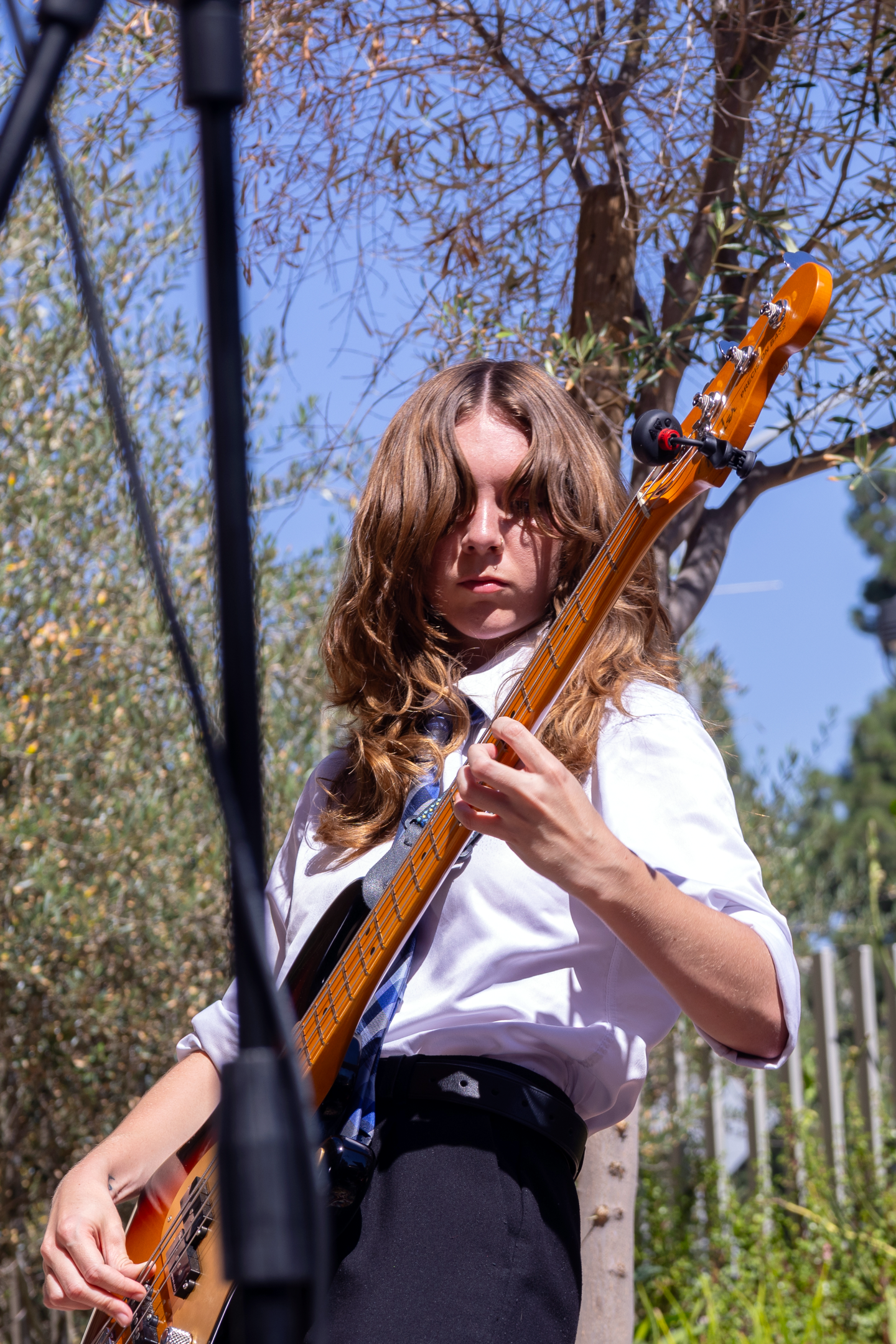 Avery Nelson, bassist and backup vocalist for Slacker, performs at KPBS in San Diego on Oct. 1, 2025.