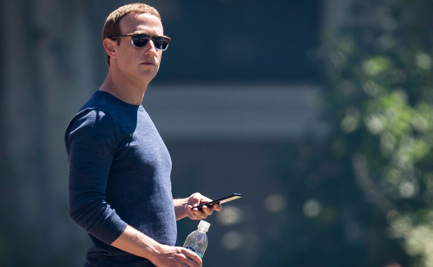 Facebook founder and CEO Mark Zuckerberg says, "I personally find Holocaust denial deeply offensive, and I absolutely didn't intend to defend the intent of people who deny that."