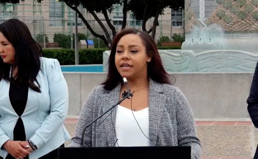 San Diego native Kileen Washington detailing her 3 1/2 year ordeal with human trafficking starting when she was 14 years old in front of the County Administration Building, Aug. 25, 2023.