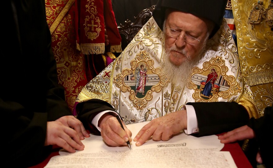 Bartholomew I signs the Tomos of Autocephaly, marking the formal independence of the Ukrainian Orthodox Church at the Patriarchal Church of St. George in Istanbul.
