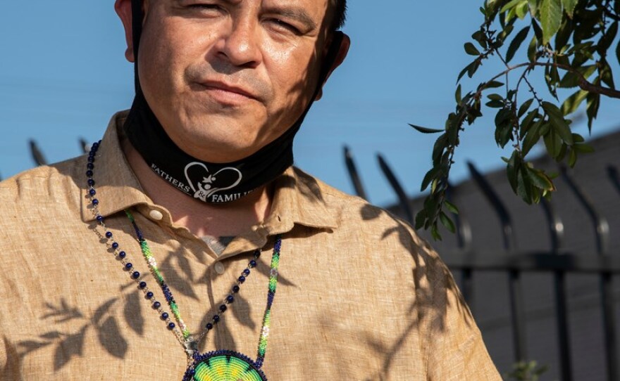 Sammy Nunez, Founder and Executive Director of Fathers & Families of San Joaquin, poses for a portrait in the Brandon Harrison Memorial Garden in Stockton, Calif. on September 23, 2020.