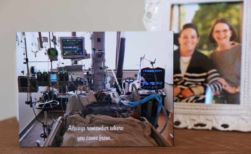 In her home office, VanSickle keeps an image of herself in the hospital after her 2014 car accident. With her law degree, VanSickle wants to become a disability rights lawyer.