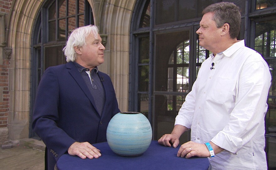 David Rago (left) appraises a Maija Grotell spherical vase, ca. 1950 at Meadow Brook Hall in Rochester, Mich.