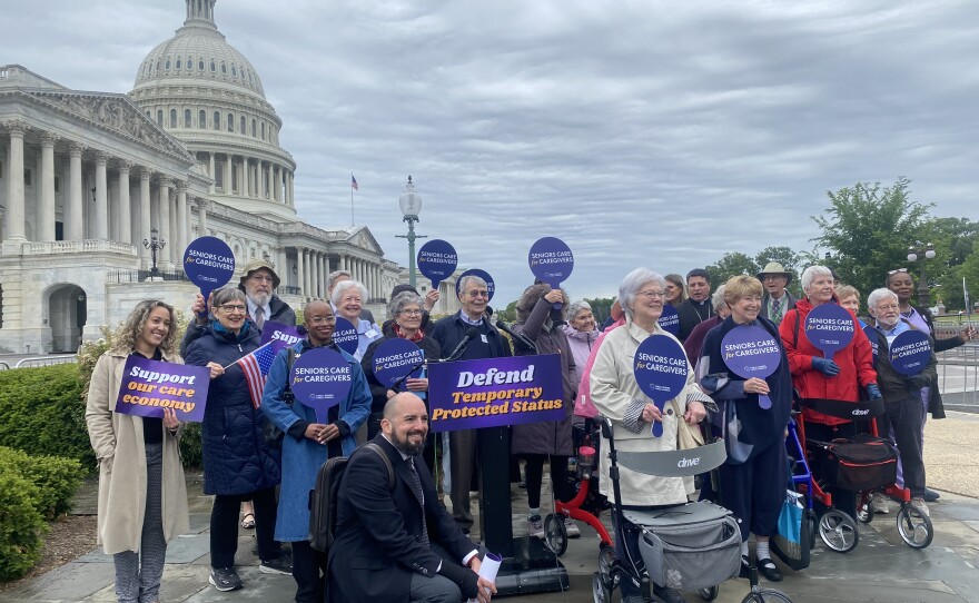 Senior citizens gathered outside the U.S. Capitol on April 28, 2026, to advocate for Temporary Protected Status for immigrant caretakers.