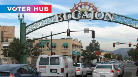Cars drive beneath the El Cajon sign on Nov. 15, 2016 with Voter Hub overlay.