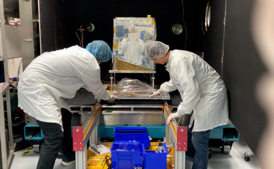 The prototype satellite was tested in a thermal vacuum chamber that simulates the environment in space.