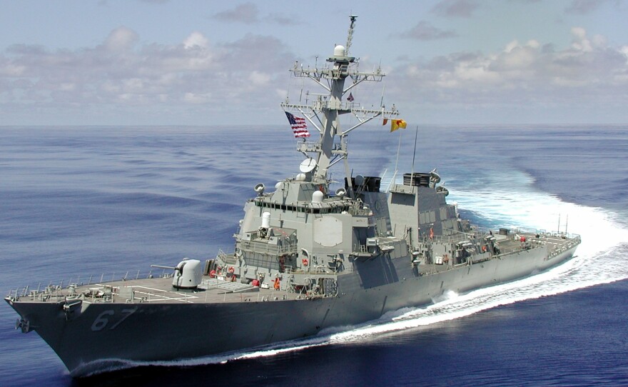 The USS Cole approximately one month before being attacked by an al-Qaida suicide mission, which killed 17 American sailors in the port of Aden, Yemen.