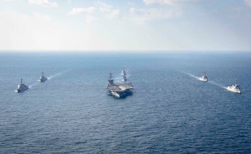 FILE - In this photo provided by South Korea Defense Ministry, warships of South Korea, the United States and Japan including the USS George Washington aircraft carrier, bottom center, take part in the trilateral Freedom Edge exercise in international waters off South Korea's southern island of Jeju, on Nov. 13, 2024.