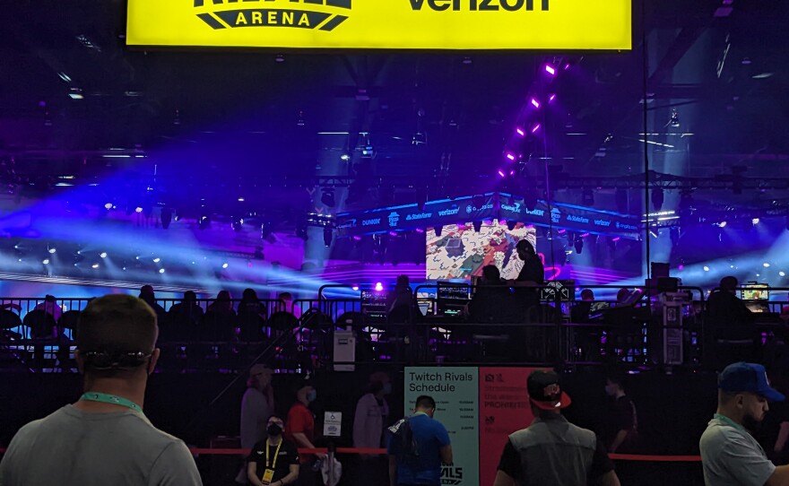 Attendees walking into the Twitch Rivals arena — an esports tournament inside TwitchCon at the San Diego Convention Center, Oct. 8, 2022.