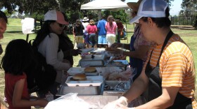 Low-income families attend a barbecue at the Kearny Mesa Recreation Center on July 1, 2010. The San Diego Unified School District and the Parks and Recreation Department hold the barbecues during the summer when low-income kids do not receive free or reduced-price lunches at school.