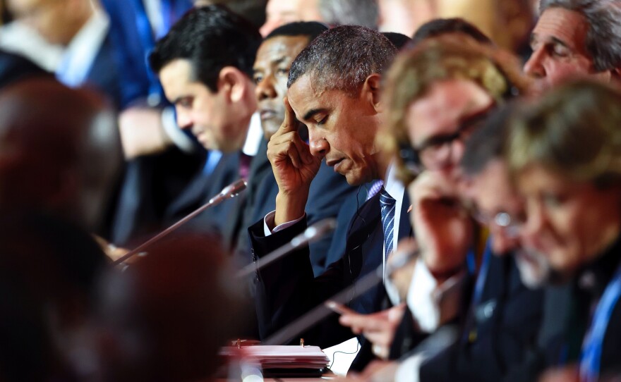 President Obama attended the plenary session of the international climate conference Monday, just outside Paris. By using regulations instead of treaties, Obama hopes to continue to cut U.S. emissions of greenhouse gases.