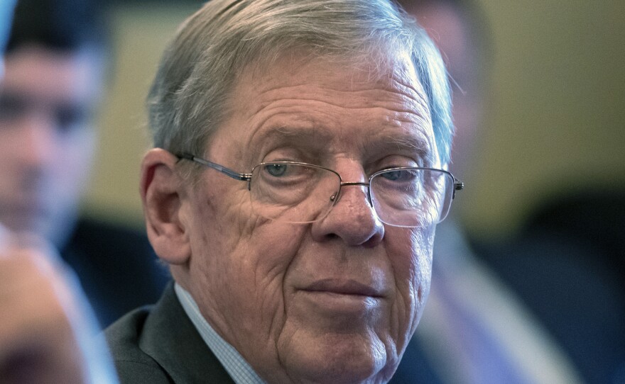 In this Feb. 14, 2019 photo, Sen. Johnny Isakson, R-Ga., leads a meeting on Capitol Hill. Isakson, an affable Georgia Republican who rose from the ranks of the state legislature to become a U.S. senator, has died at age 76.