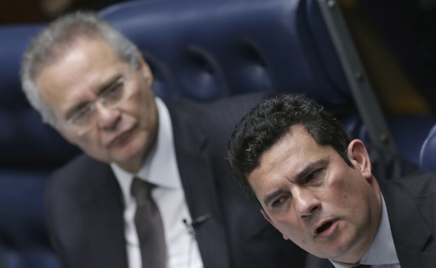 Brazilian Federal Judge Sergio Moro (right) is leading his country's corruption probe of state-run oil company Petrobras. Two Brazilian companies have agreed to more than $3.5 billion in fines for violating U.S. bribery laws in their dealings with Petrobras.